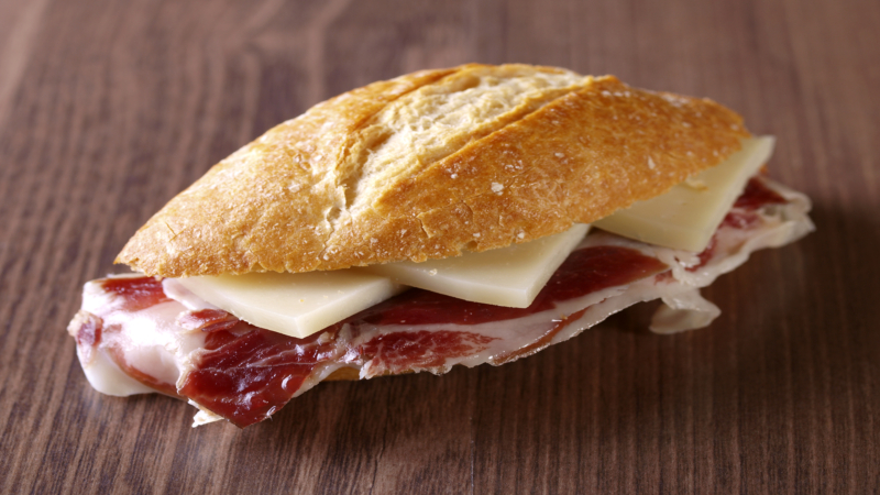 Cured ham and cheese sandwich.
